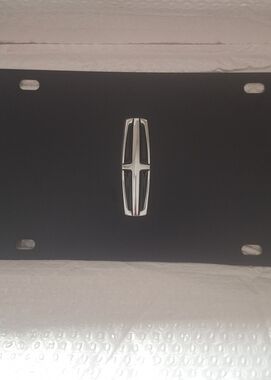 Lincoln Flat Black License Plate With Chrome 3D Logo.